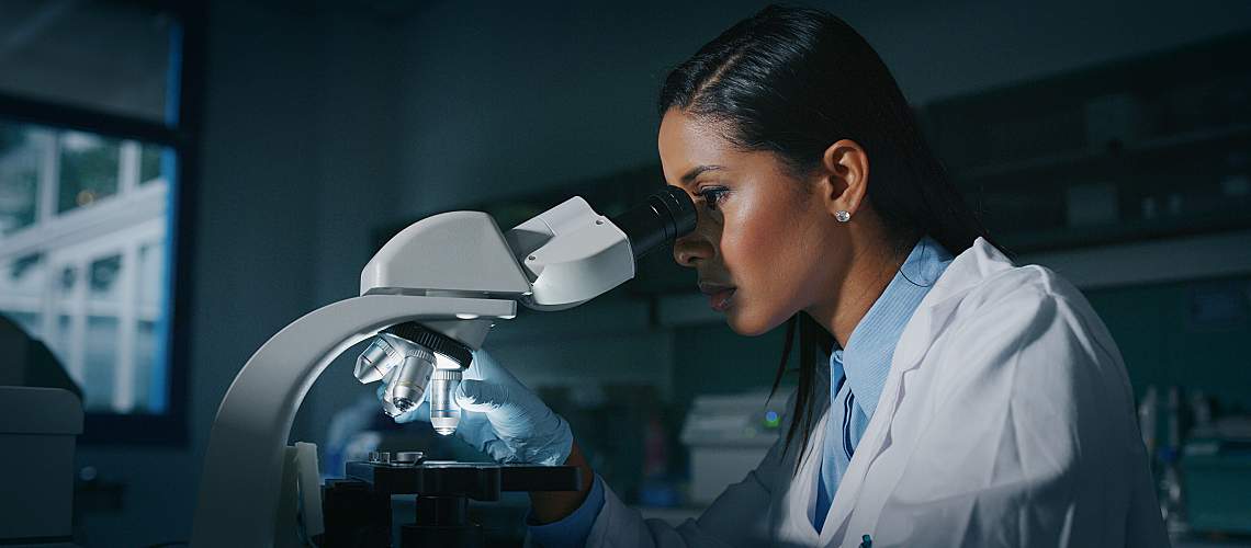 Water lab scientist analyzing sample with AI.