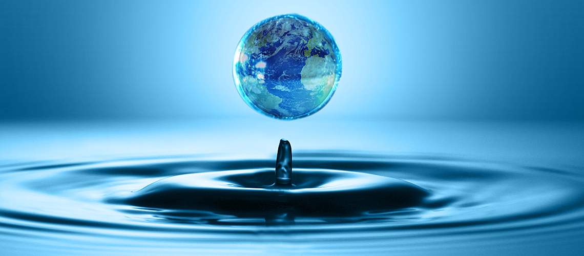 Droplet of water shaped like the world.