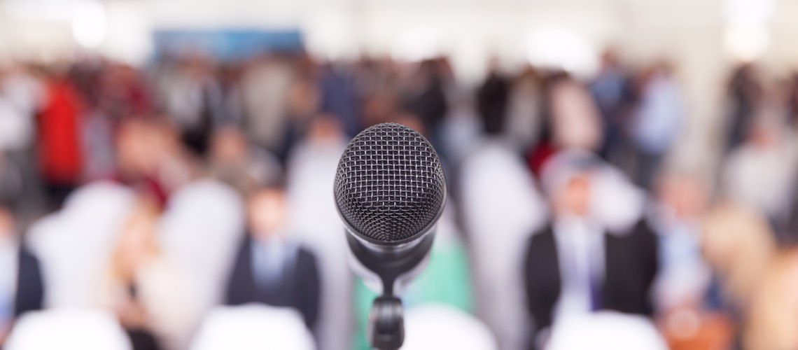 Microphone in front of a conference session.