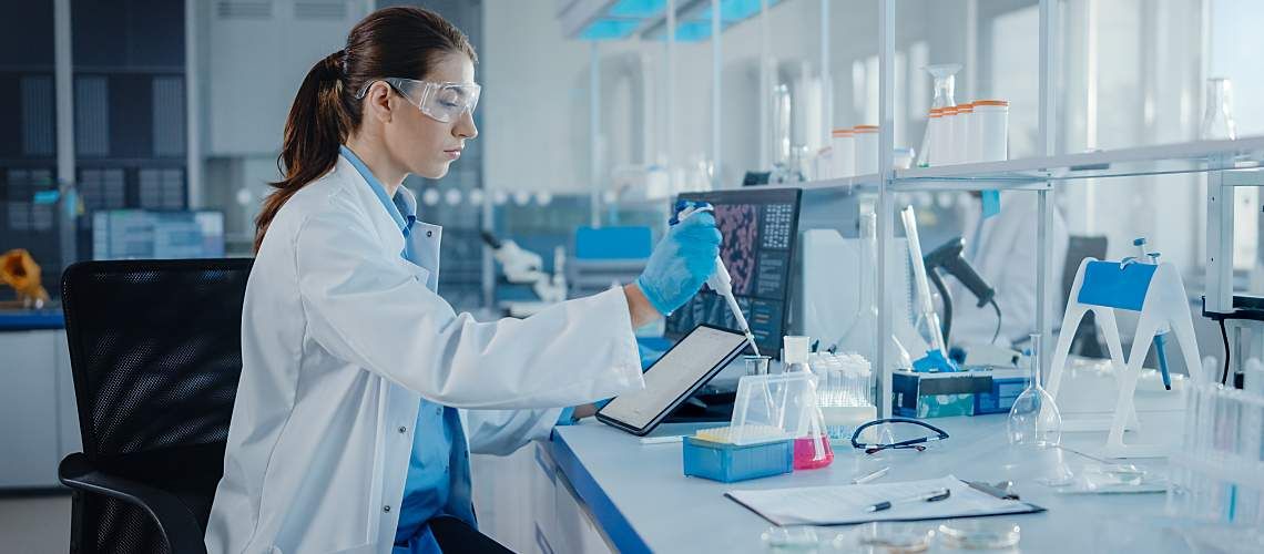 A lab worker analyzes samples.