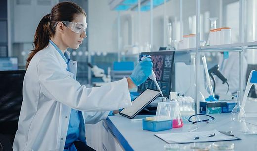 A lab worker analyzes samples.