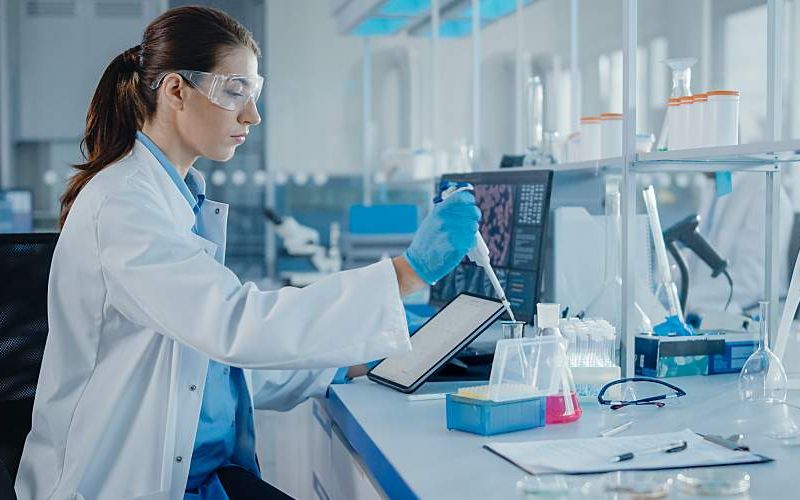 A lab worker analyzes samples.