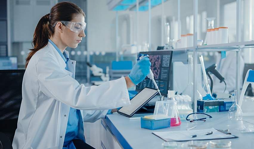 A lab worker analyzes samples.