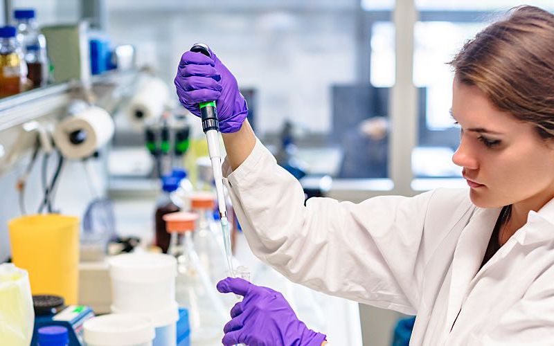 Female scientist works in a lab