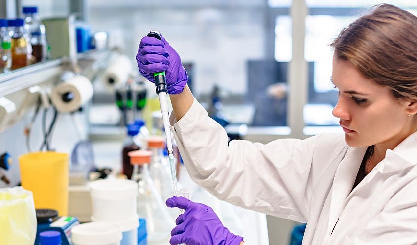 Female scientist works in a lab