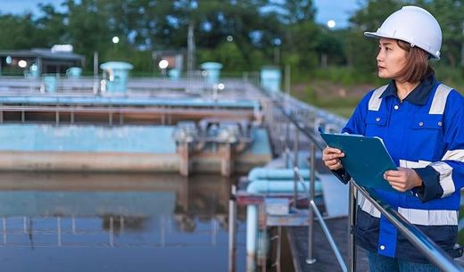 Environmental engineers work at wastewater treatment plants.