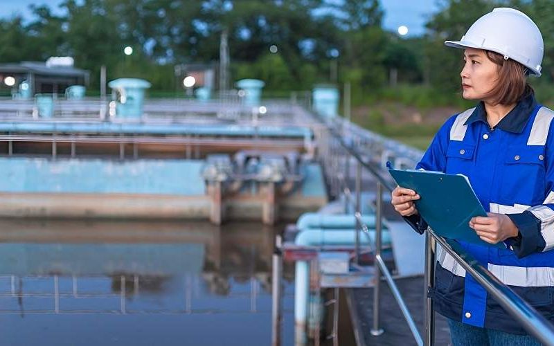 Environmental engineers work at wastewater treatment plants.