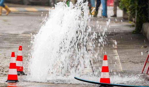 Water main break on a main street in town.