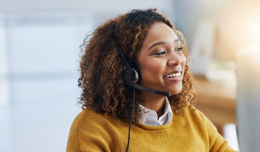 Customer service representative on the phone with a customer at a water lab.