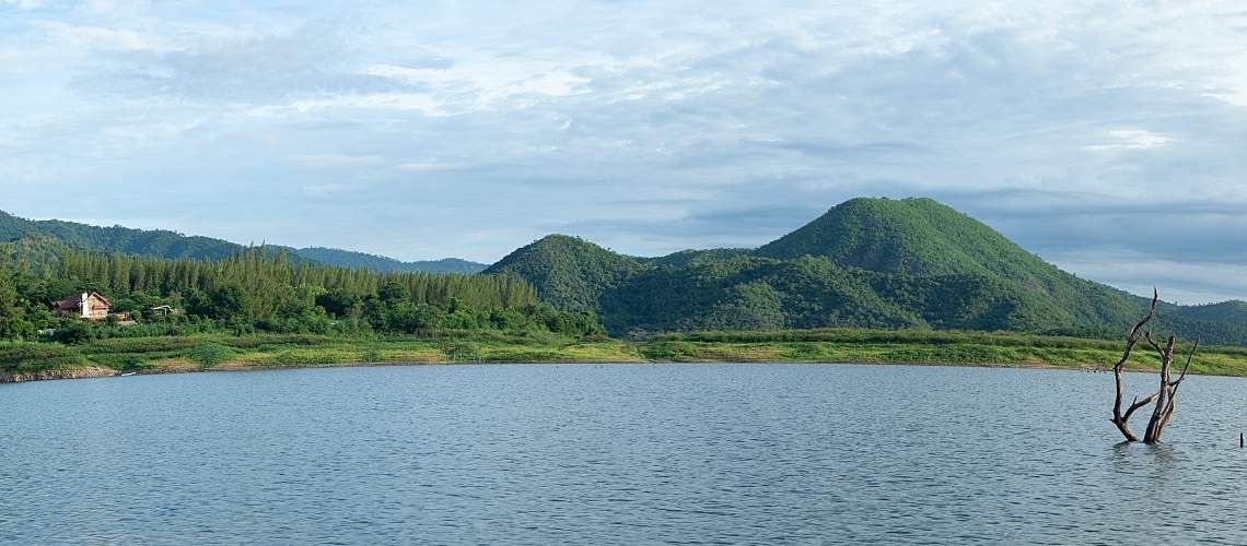 A reservoir viewpoint with mountains in the background.