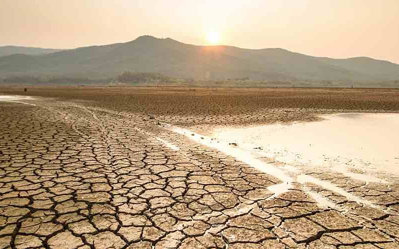 A drying lake illustrates seasonal drought.