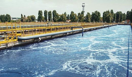 A reservoir for sewage at a wastewater treatment plant.