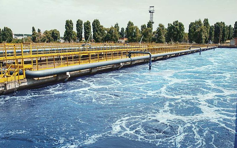A reservoir for sewage at a wastewater treatment plant.
