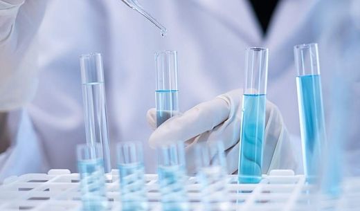 A researcher uses a pipette to test water.