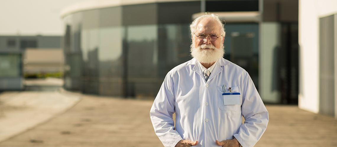 Lab manager standing in front of a water lab.