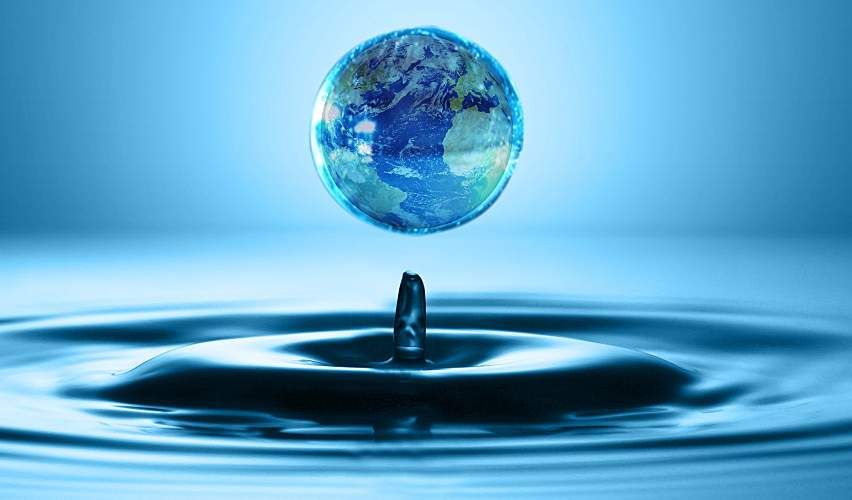 Droplet of water shaped like the world.